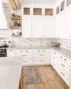 Kitchen with Brass Hardware White Cabinets