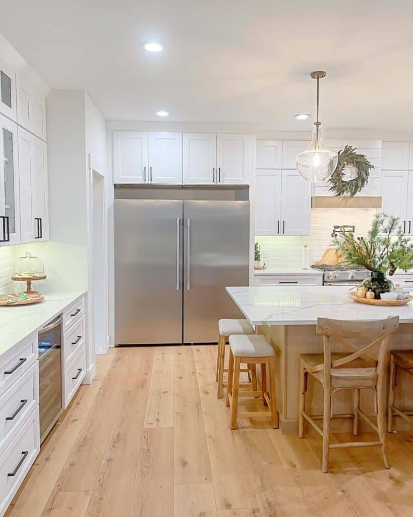 Kitchen with White Above Refrigerator Cabinets