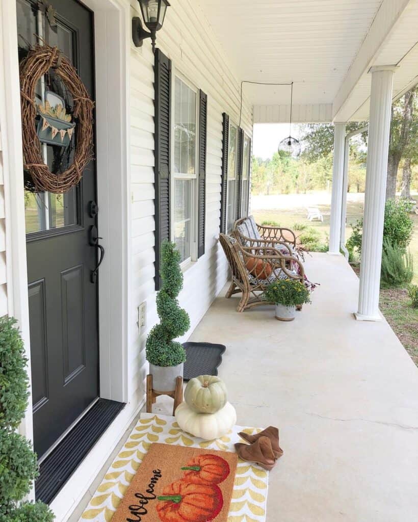 Large Front Porch with Black Front Door with Glass