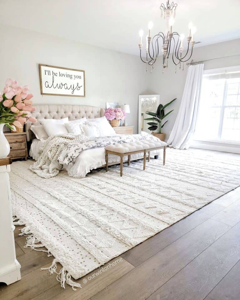 Large White Area Rug on Warm Wood Floor