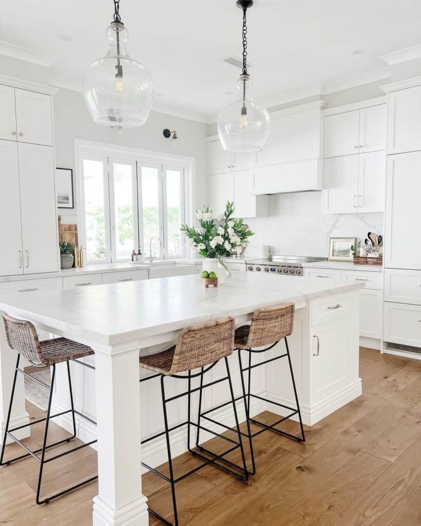 Large White Kitchen with Glass Pendant Lighting