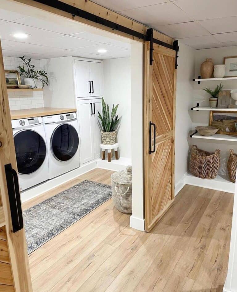 Laundry Room with Light Wood Flooring