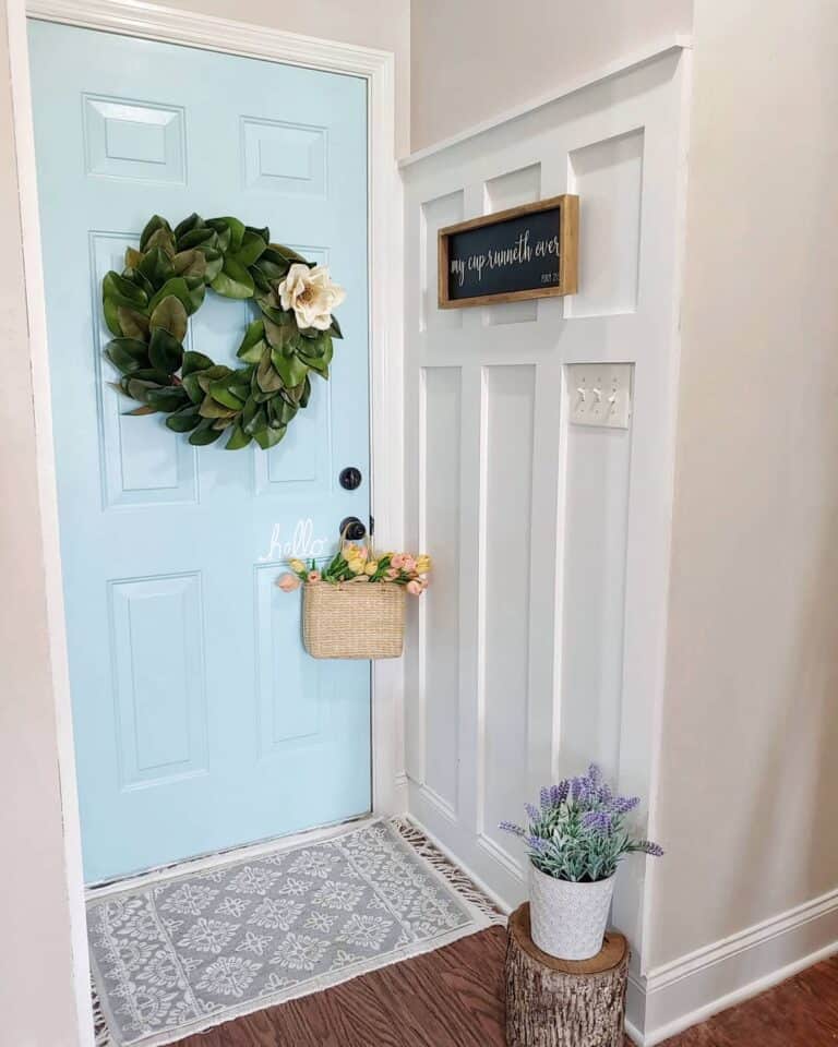 Leaf Wreath on a Light Blue 6-panel Front Door