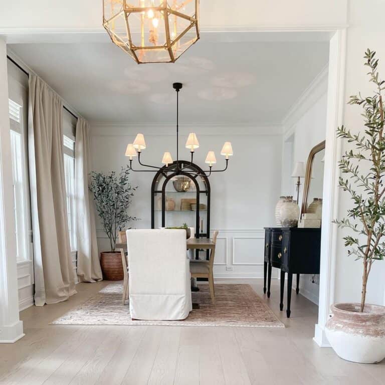 Light Blue Dining Room with Black Buffet