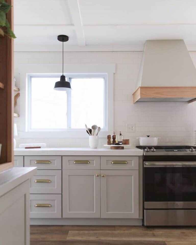 Light Gray Kitchen with Satin Brass Cabinet Pulls