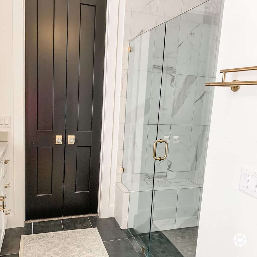 Light Grey Vertical Tile Shower with Glass Doors