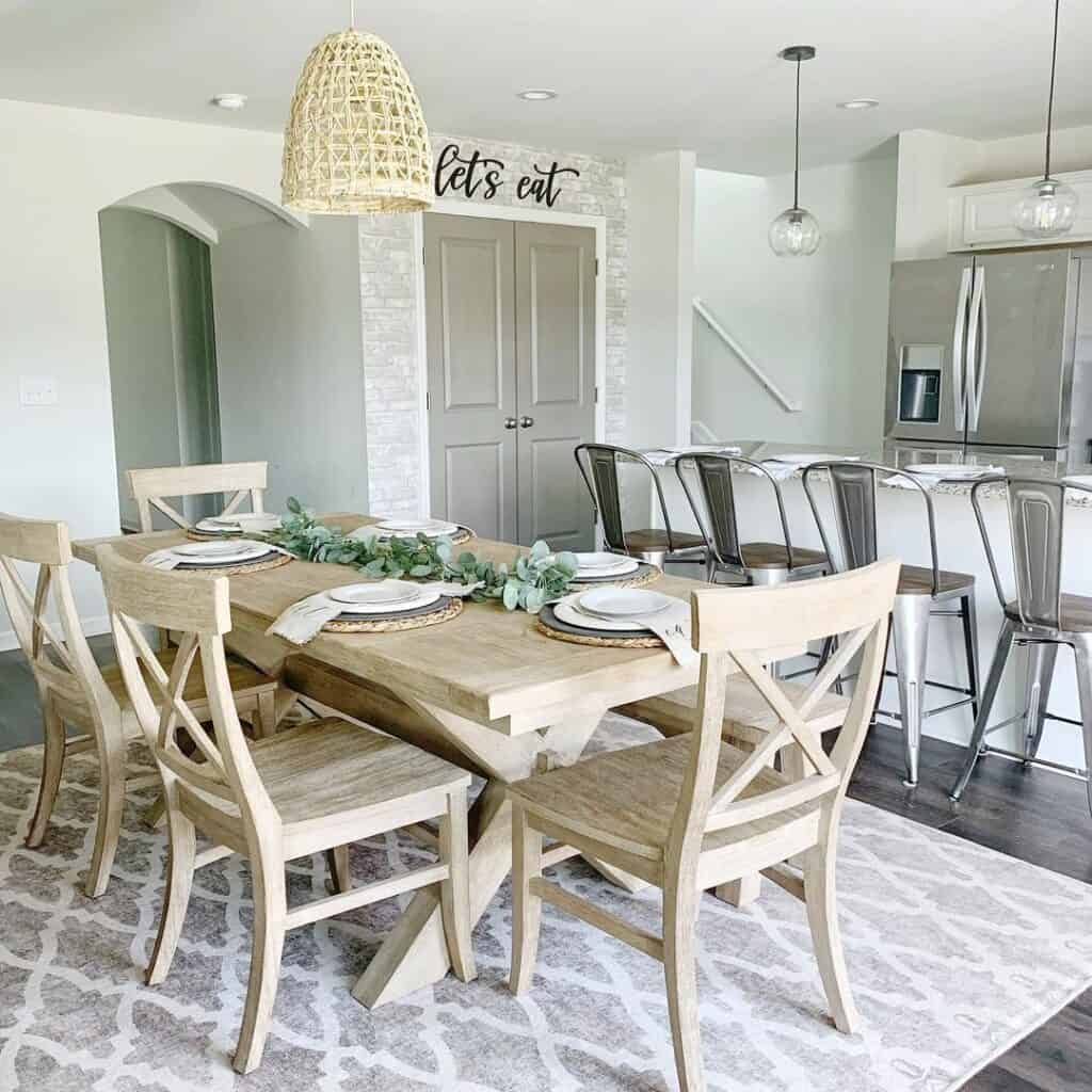 Light Yellow Rattan Pendant Lamp Over Table Set for Dinner