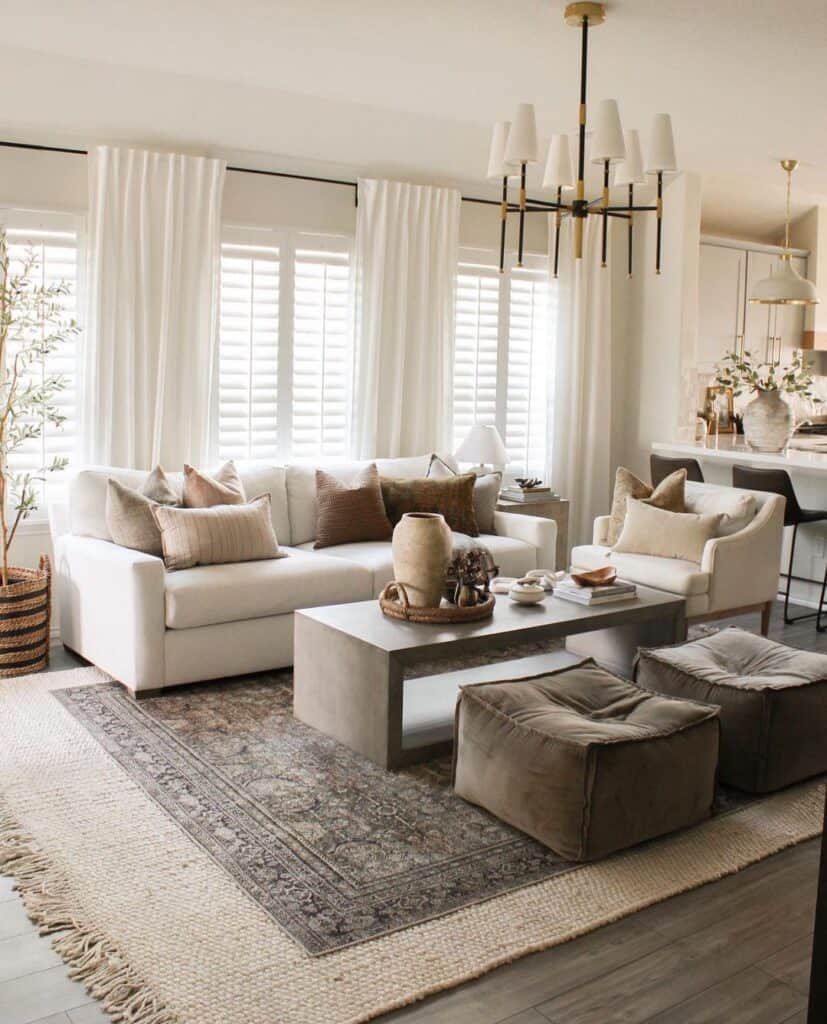 Living Room with White Floor to Ceiling Curtains