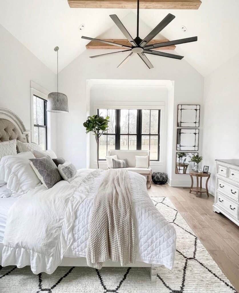 Modern Bedroom With Vaulted Ceiling and Cross Beams