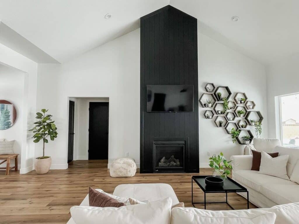 Modern Black Fireplace Under Vaulted Ceilings - Soul & Lane