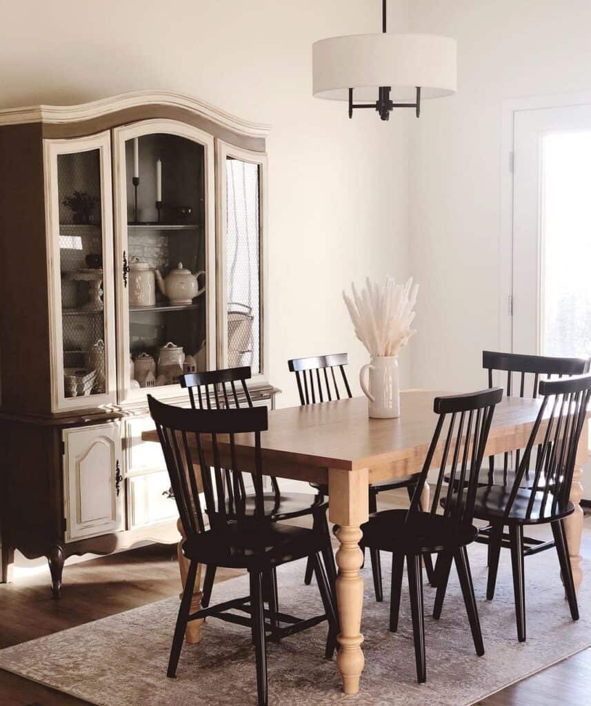 Modern Black Wood Dining Chairs on a Beige Rug