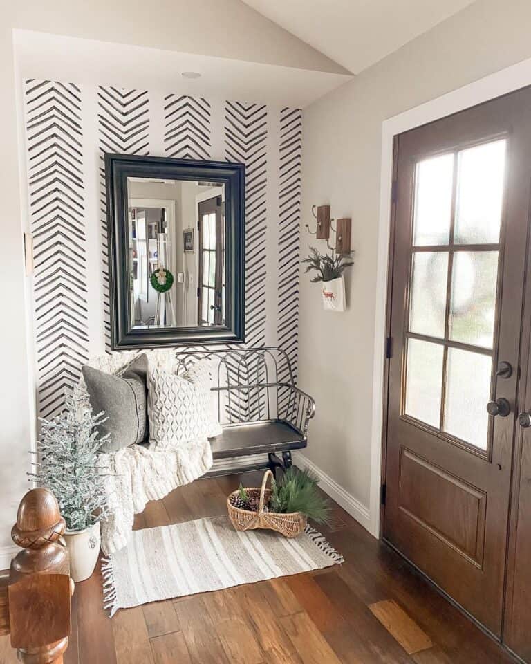 Naturally Lit Entryway with Black Bench