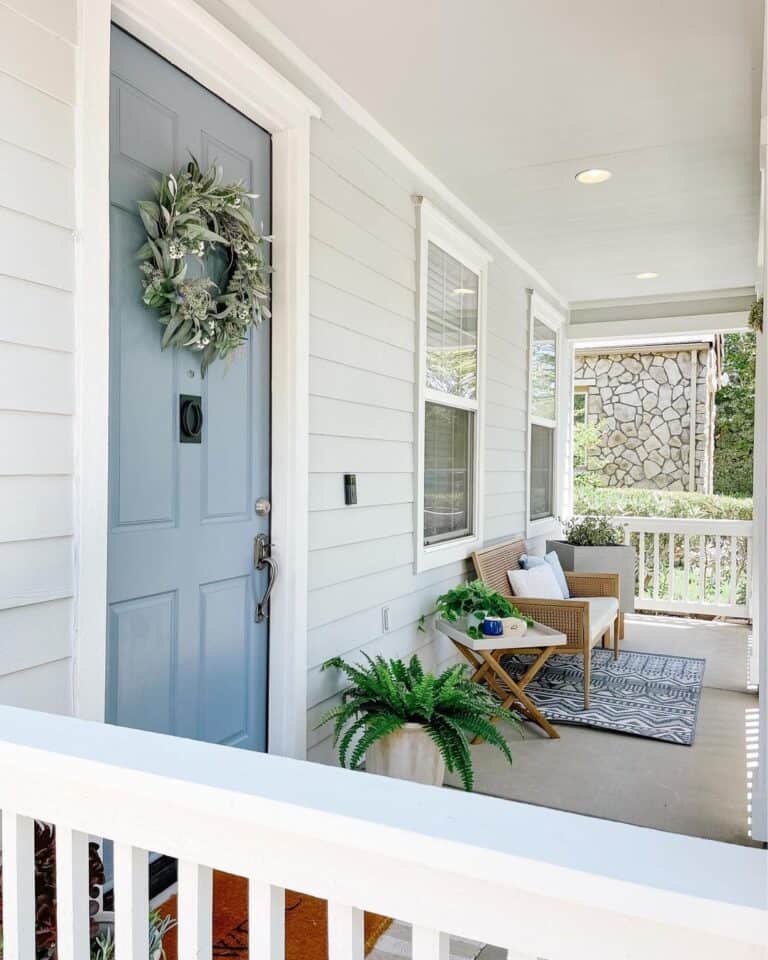 Neutral Porch with Pale Blue Front Door