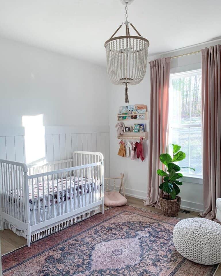 Nursery with Pink Drapes and White Crib