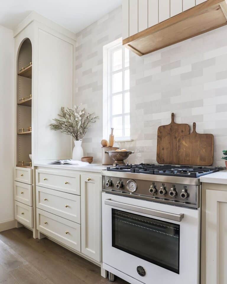 Off-White Cabinets with Brass Cabinet Knobs