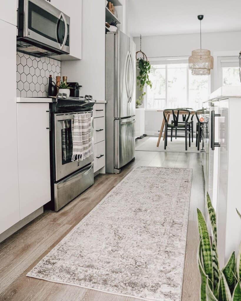 Off-White Kitchen Runner Rug and White Hexagon Tile Backsplash