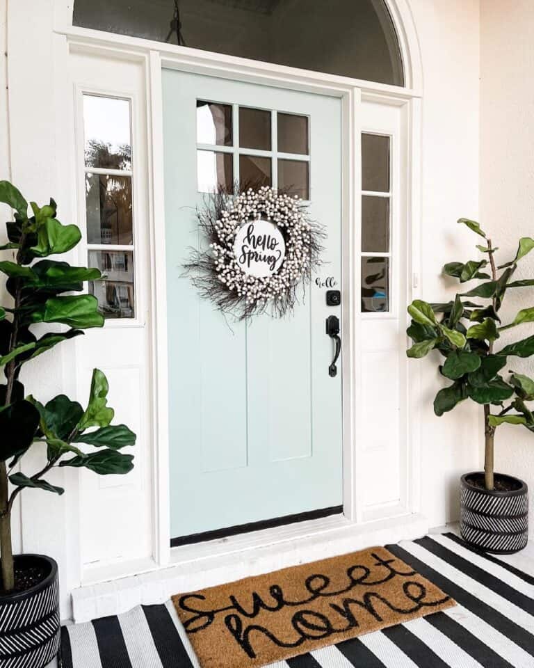 Pale Blue Front Door with Monochrome Accessories
