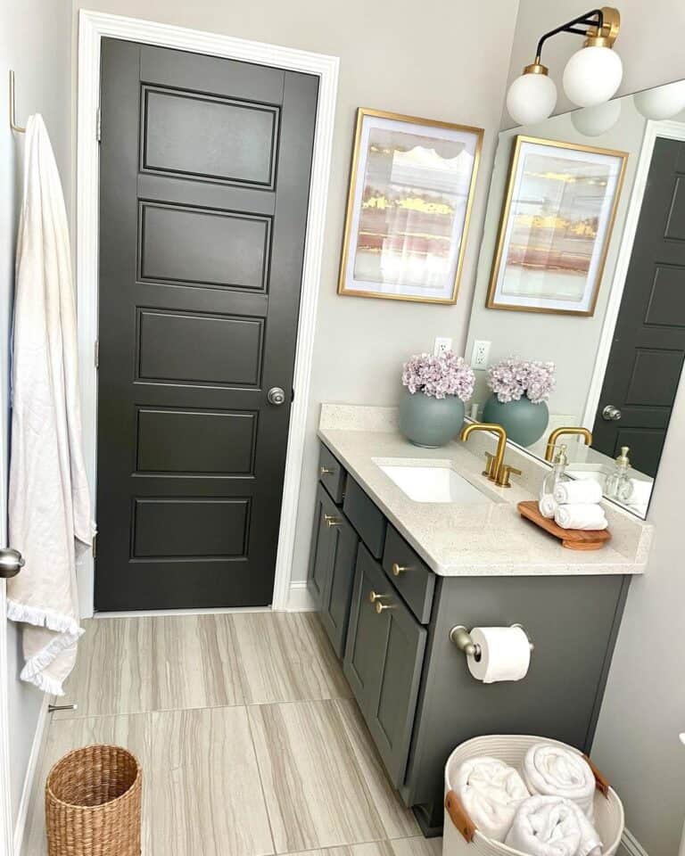 Paneled Bathroom Door and Gray Vanity