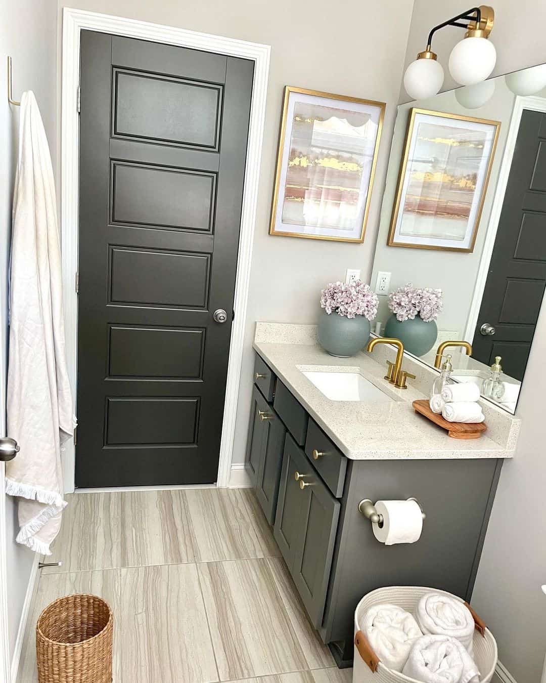 Paneled Bathroom Door and Gray Vanity - Soul & Lane