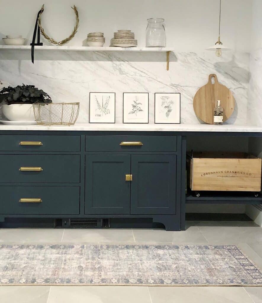 Pantry with White Marbled Quartz Backsplash