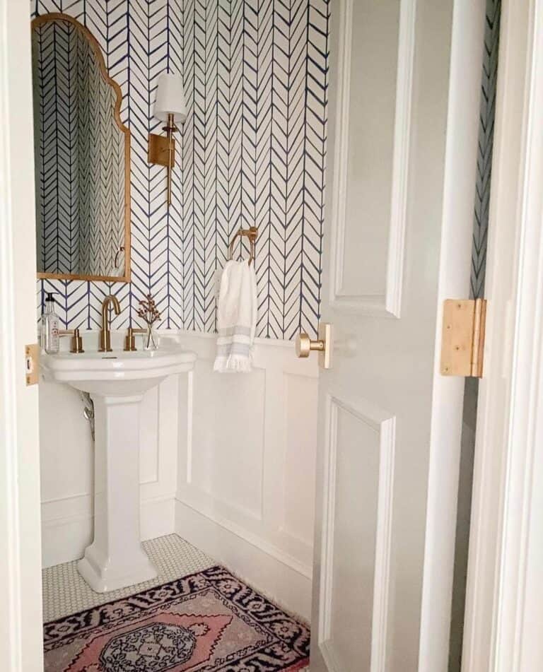 Pedestal Sink in Arched Mirror Bathroom