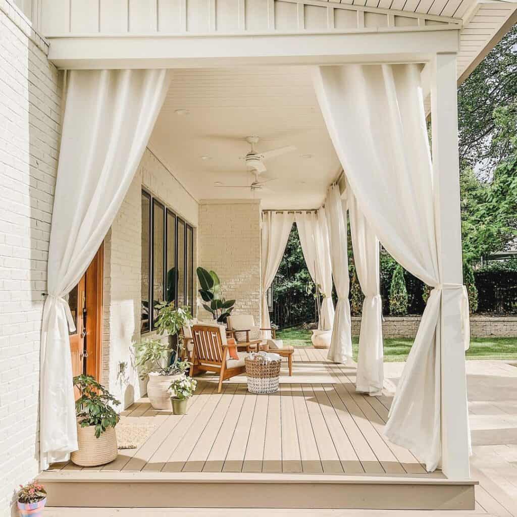 Porch Framed by Outdoor Grommet Curtains