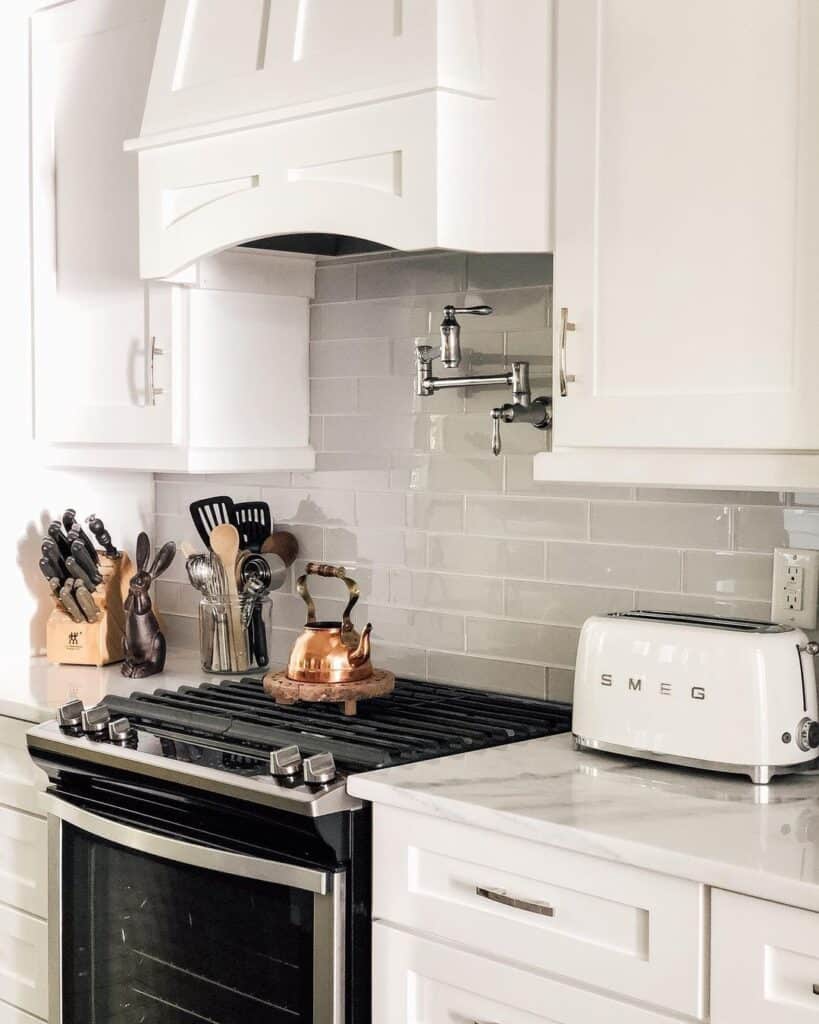 Quartz Countertops with Light Gray Subway Tile Backsplash