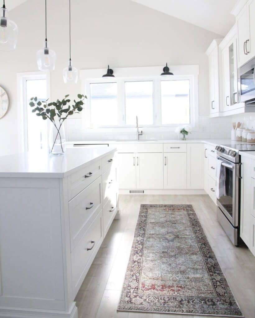 Red and Black Kitchen Runner Rug and White Cabinets