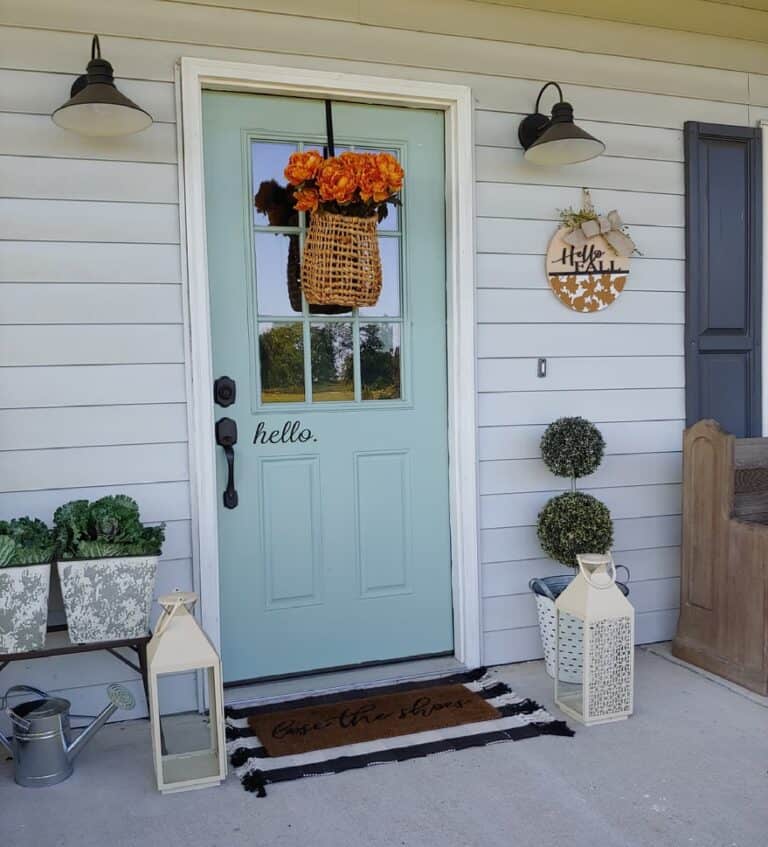 Rustic Fall Porch with Pale Blue Front Door