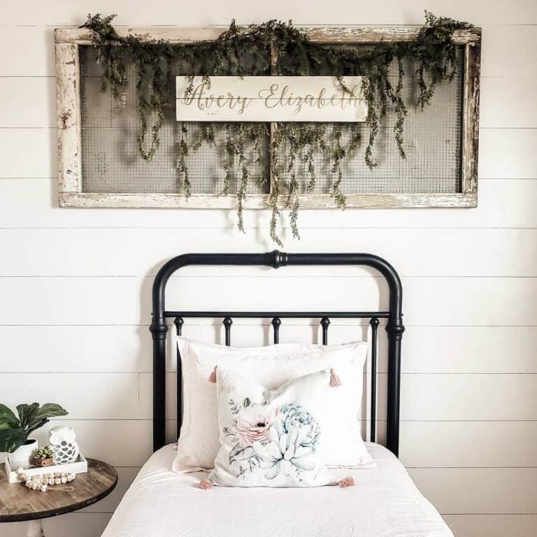 Rustic Frame with Foliage Above Bed