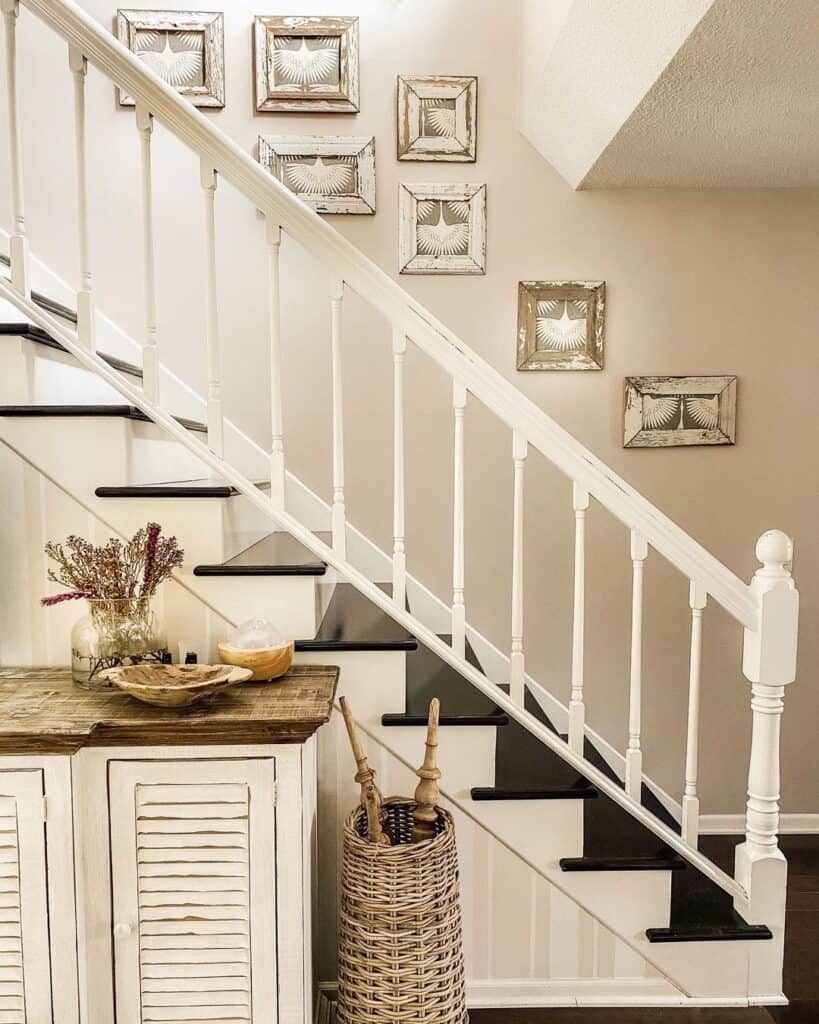 Rustic White Frames Above Black and White Staircase
