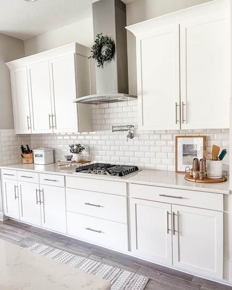 Shaker Cabinets with Flat Crown Molding in a White Kitchen