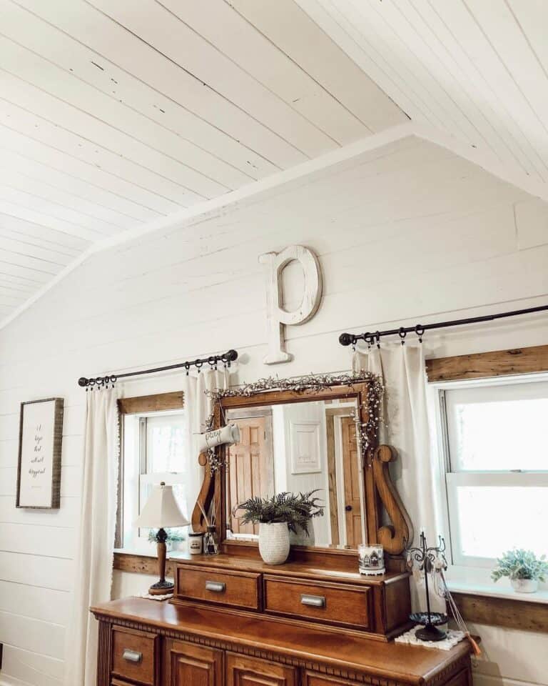 Shiplap Vaulted Ceiling with Antique Side Table