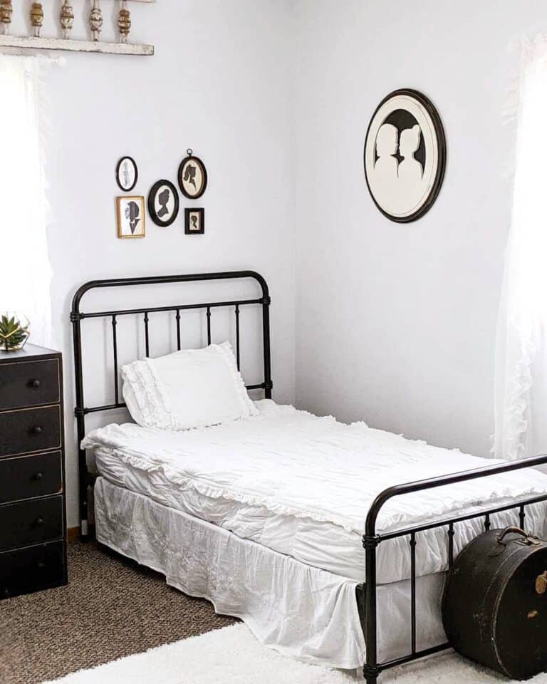 Silhouette Wall Décor Over Metal Bedframe