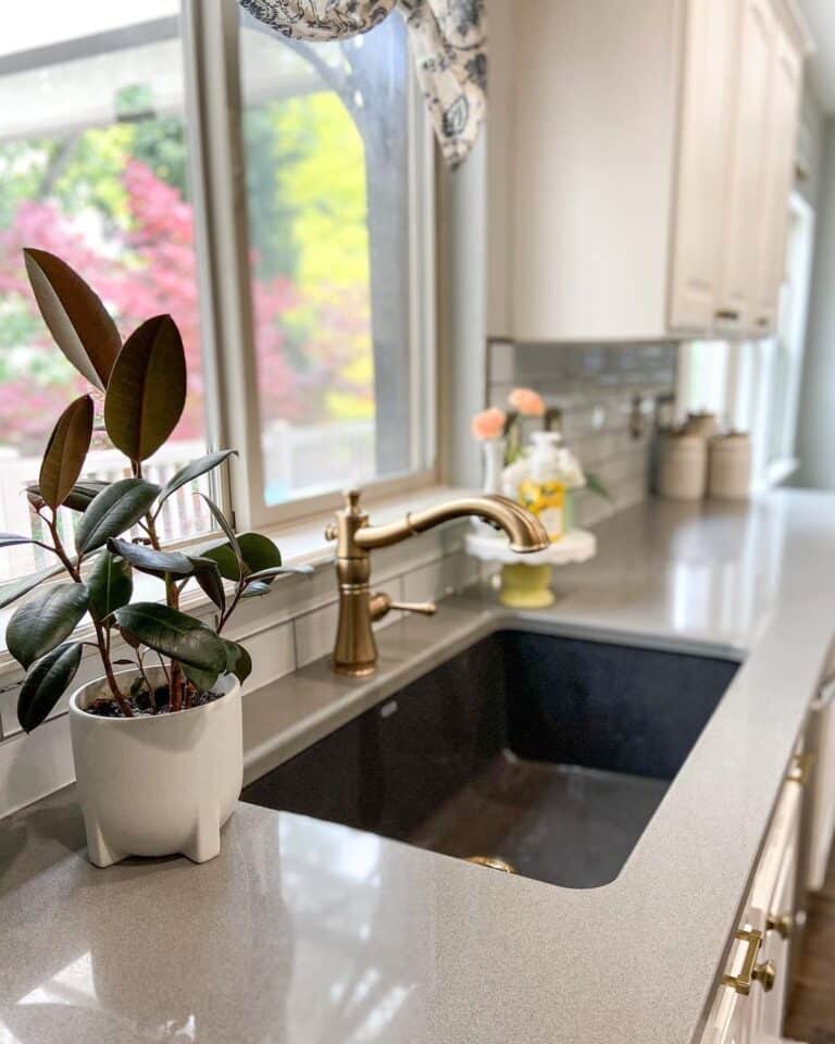 Sink with Brushed Gold Faucet