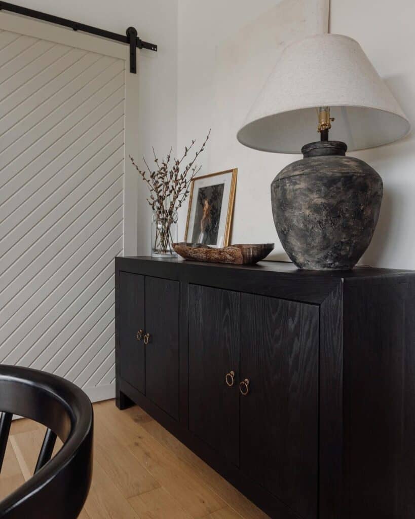 Sliding Barn Door and Dark Wood Sideboard