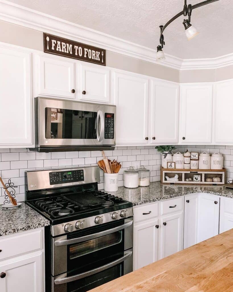 Stainless Steel Appliances and White Cabinets