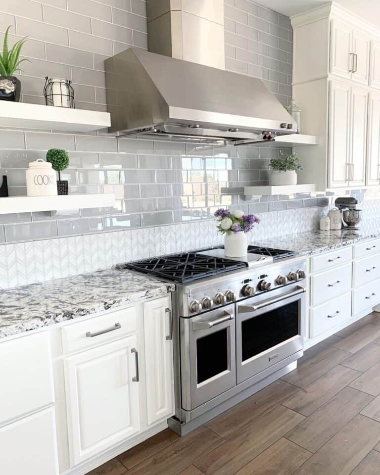 Stainless Steel Range in Gray Tiled Kitchen