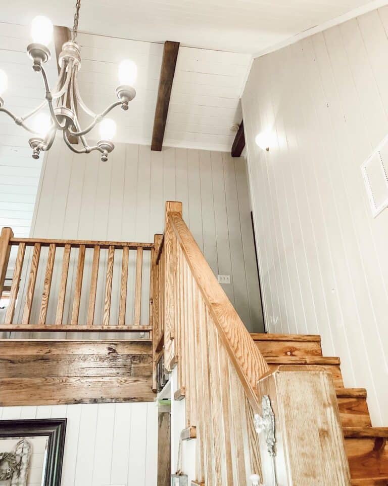 Staircase with Light Gray Vertical Shiplap Walls