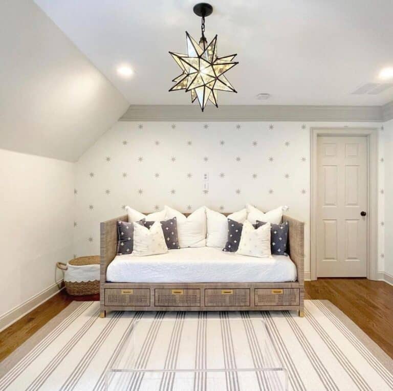 Star Pendant Lighting Above Daybed with Drawers