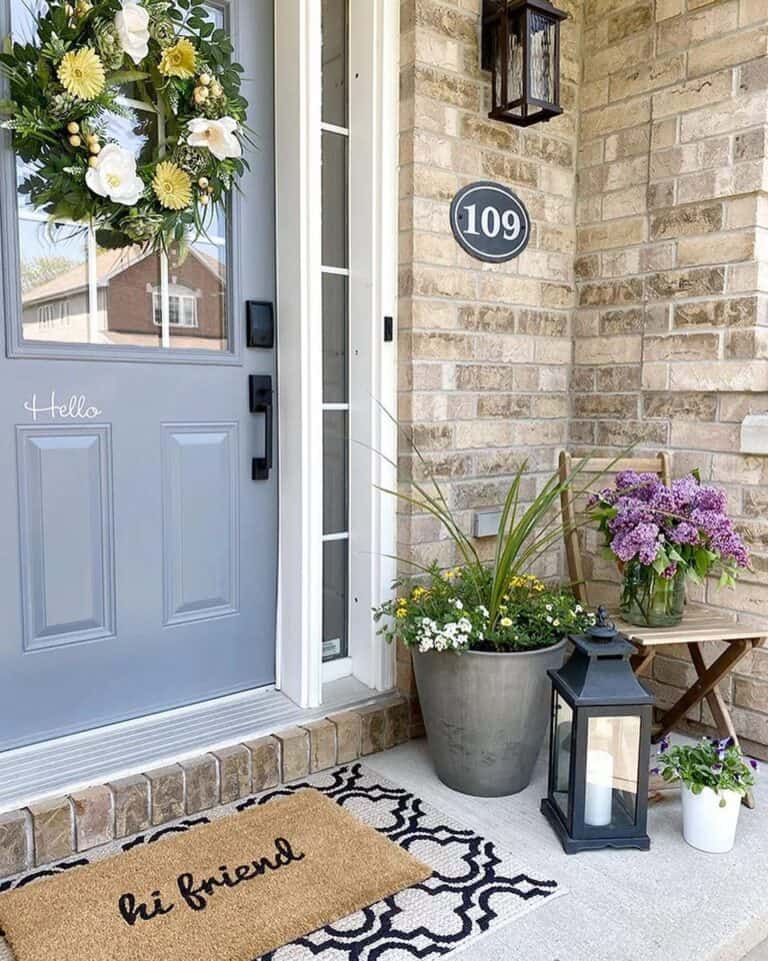 Summer Porch Featuring Pale Blue Front Door