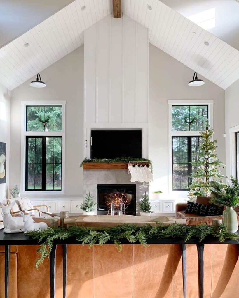 Two Black Sconces on a Light Grey Living Room Wall