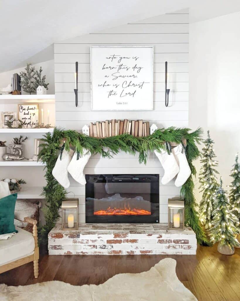 Two Tall Black Sconces on a Grey Shiplap Fireplace