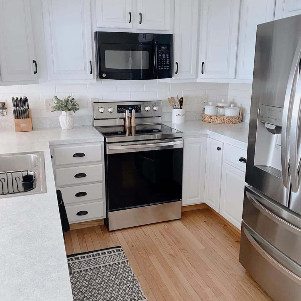 U-Shaped Kitchen with White Cabinets