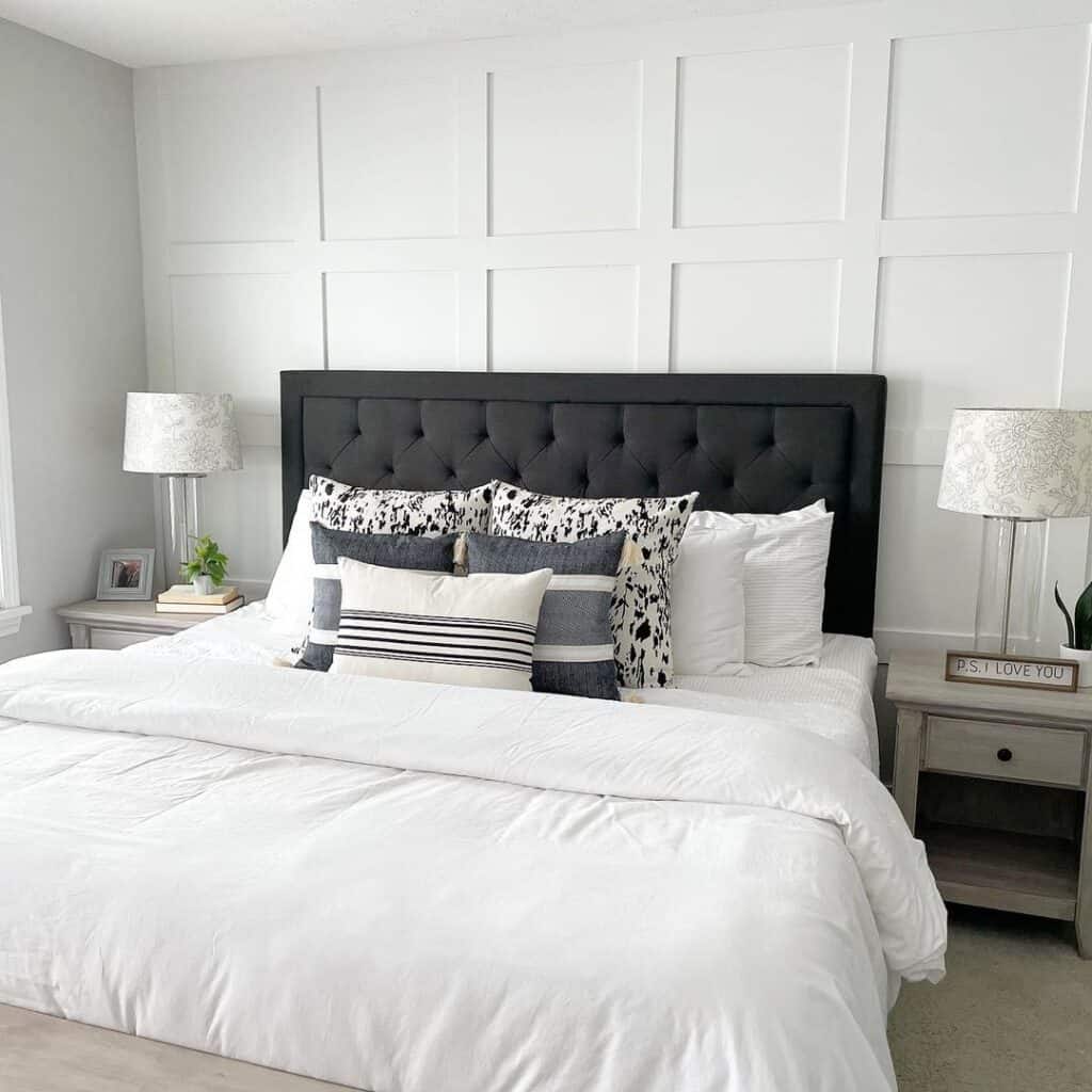 Upholstered Black Bedframe and White Bedding