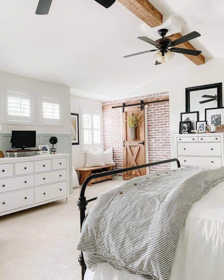 Vaulted Ceiling Bedroom with Brick Feature Wall