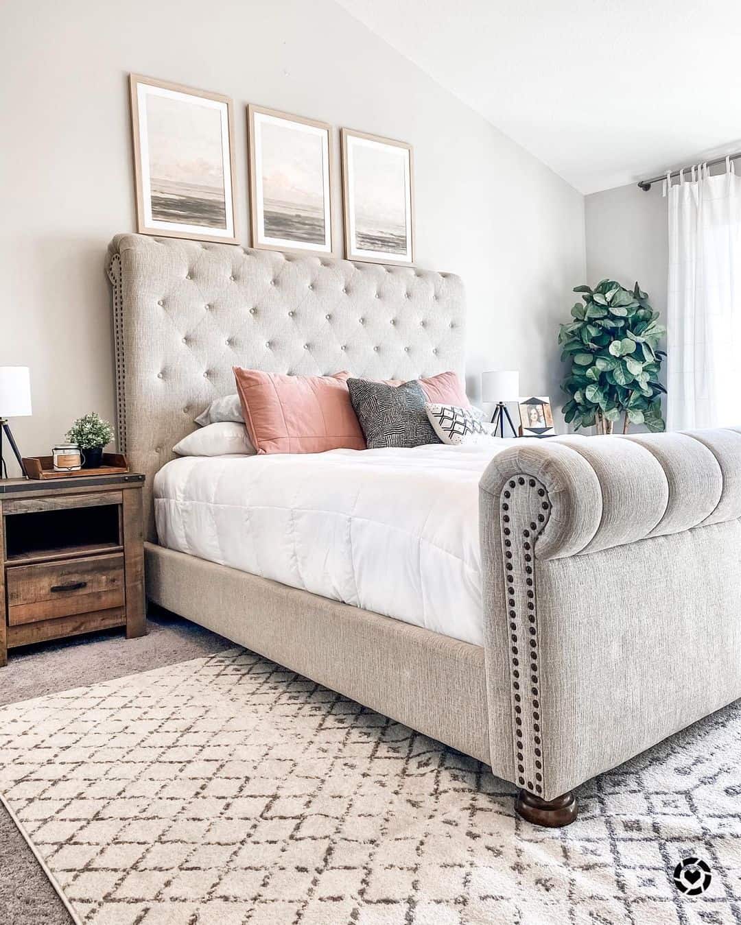 Bedroom with store tufted headboard