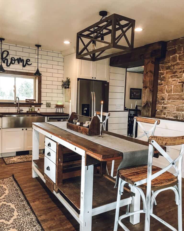 Vintage Kitchen Island with Dark Wood and Metal Cup Pulls