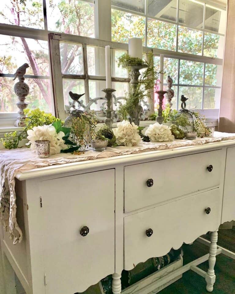 Vintage Sideboard Accessorized with Flowers and Candlesticks