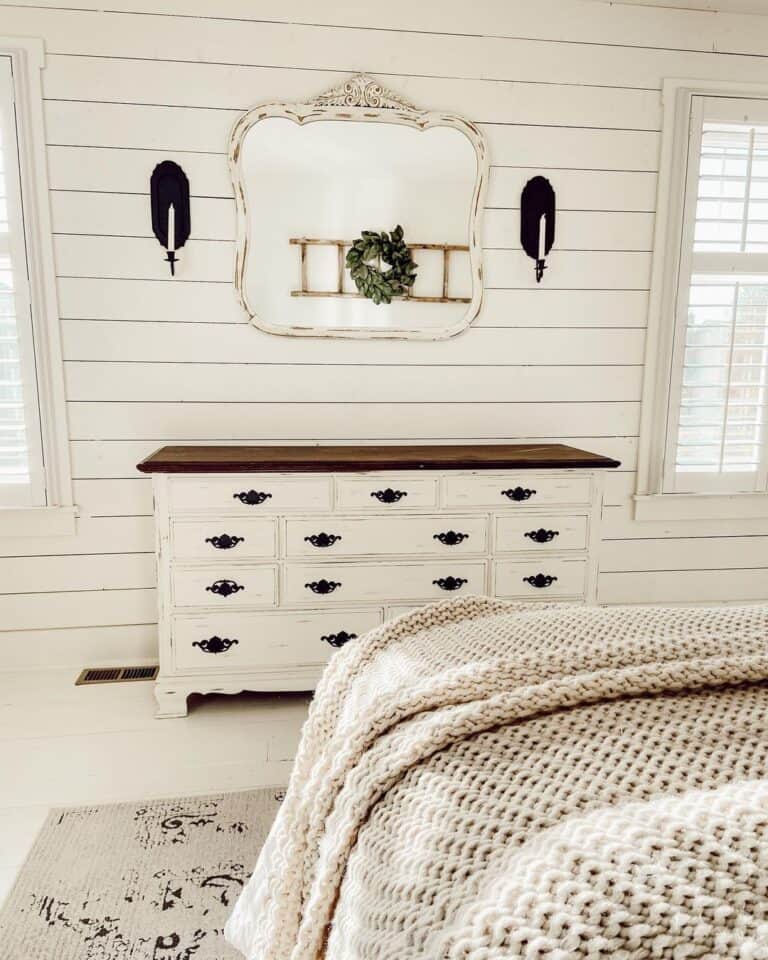 Wall Candle Holders Over White Dresser